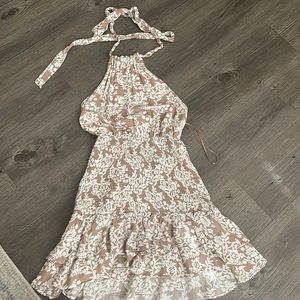 Very cute floral halter top dress. Wore to go wedding dress shopping once.